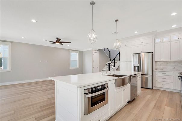 Interior, Kitchen, Pendant Lights, Recessed Lighting, Stainless Steel Appliances, Wood Texture Flooring