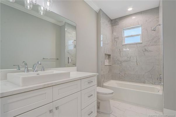 Bathroom, Dual Sink Vanities, Interior, Marble, Marble Walls, Recessed Lighting