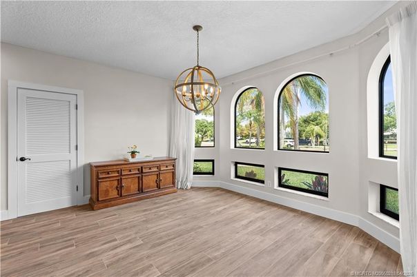Chandelier, Empty room, Fireplace, Interior, Wood Texture Flooring