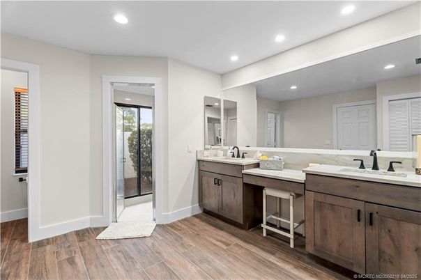 Bathroom, Dual Sink Vanities, Interior, Recessed Lighting, Wood Texture Flooring
