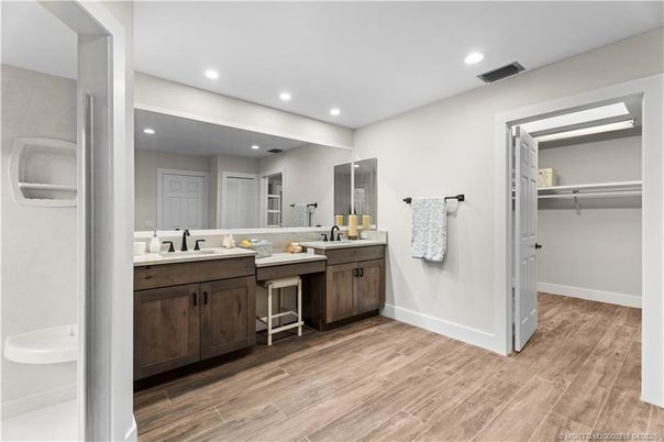 Bathroom, Dual Sink Vanities, Interior, Recessed Lighting, Wood Texture Flooring
