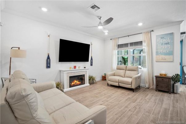Fireplace, Interior, Living room, Recessed Lighting, Wood Texture Flooring