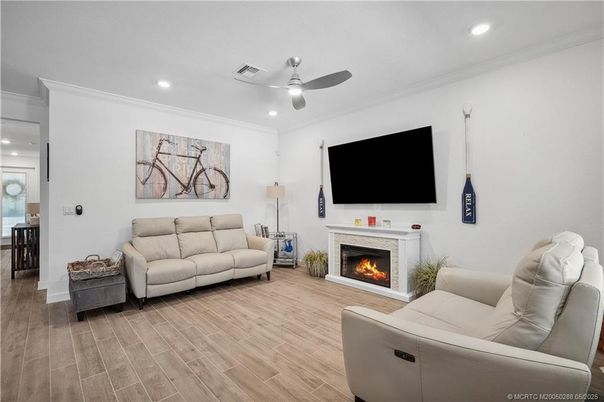 Fireplace, Interior, Living room, Recessed Lighting, Wood Texture Flooring