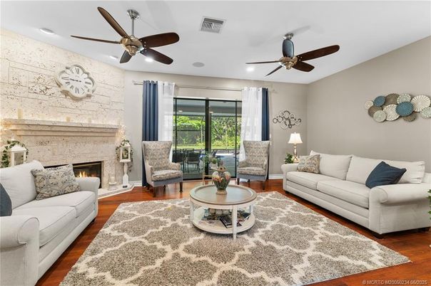 Fireplace, Interior, Living room, Recessed Lighting, Stone Walls, Wood Texture Flooring
