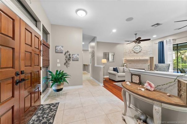 Fireplace, Interior, Living room, Recessed Lighting, Stone Walls, Wood Texture Flooring