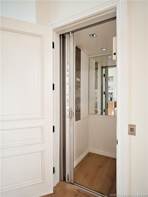 Elevator, Interior, Recessed Lighting, Wood Texture Flooring