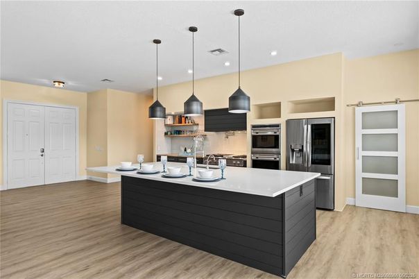 Interior, Kitchen, Pendant Lights, Recessed Lighting, Stainless Steel Appliances, Wood Texture Flooring