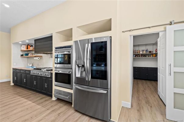 Interior, Kitchen, Recessed Lighting, Stainless Steel Appliances, Wood Texture Flooring