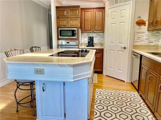 Interior, Kitchen, Stainless Steel Appliances, Tile Countertops, Wood Texture Flooring