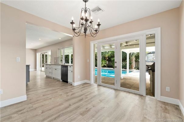 Chandelier, Empty room, Interior, Kitchen, Recessed Lighting, Wood Texture Flooring