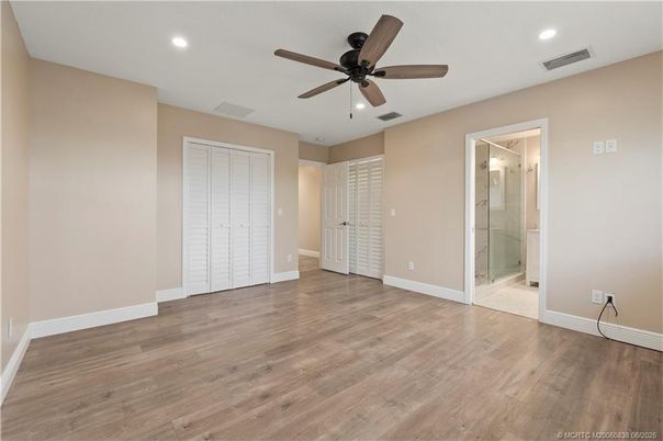 Bathroom, Empty room, Glass Shower, Interior, Recessed Lighting, Wood Texture Flooring