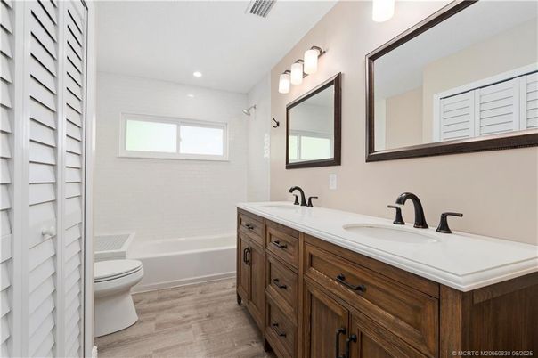Bathroom, Dual Sink Vanities, Interior, Recessed Lighting, Wood Texture Flooring