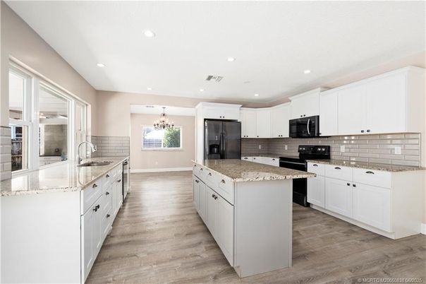 Chandelier, Interior, Kitchen, Recessed Lighting, Stainless Steel Appliances, Wood Texture Flooring