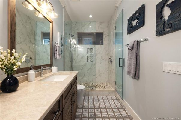 Bathroom, Dual Sink Vanities, Glass Shower, Interior, Marble Walls, Recessed Lighting