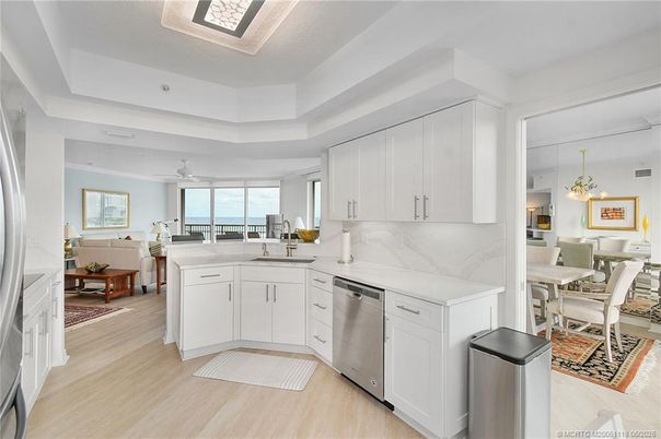 Dining room, Interior, Kitchen, Pendant Lights, Stainless Steel Appliances, Water, Wood Texture Flooring