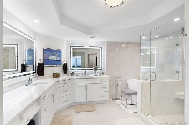 Bathroom, Dual Sink Vanities, Glass Shower, Interior, Marble, Marble Walls, Recessed Lighting