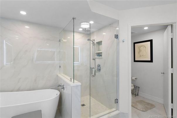 Bathroom, Free Standing Baths, Glass Shower, Interior, Marble Walls, Recessed Lighting