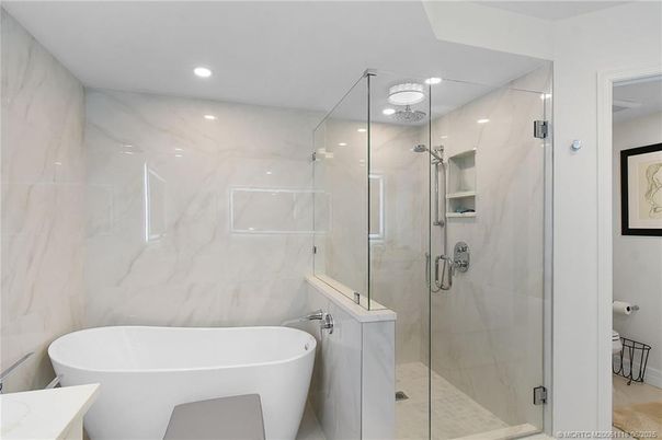 Bathroom, Free Standing Baths, Glass Shower, Interior, Marble Walls, Recessed Lighting