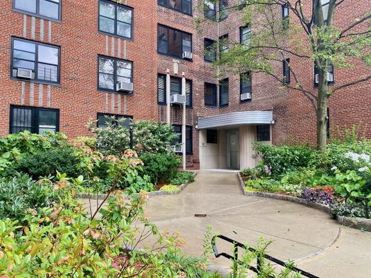 Exterior, Facade, Brick Facade, Condo Building