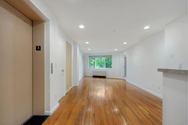 Elevator, Interior, Recessed Lighting, Wood Texture Flooring