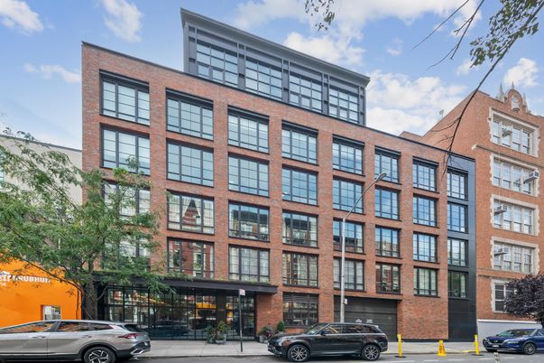 Exterior, Facade, Brick Facade, Condo Building