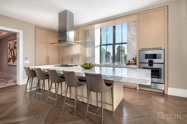 Interior, Kitchen, Marble Walls, Recessed Lighting, Stainless Steel Appliances, Wood Texture Flooring