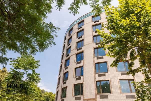 Exterior, Facade, Brick Facade, Condo Building
