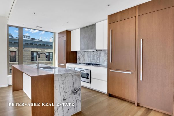 Interior, Kitchen, Marble Walls, Recessed Lighting, Stainless Steel Appliances, Wood Texture Flooring