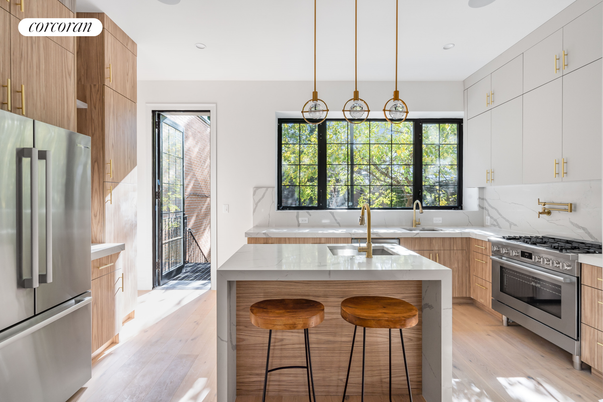 Interior, Kitchen, Marble Walls, Pendant Lights, Recessed Lighting, Stainless Steel Appliances, Wood Texture Flooring