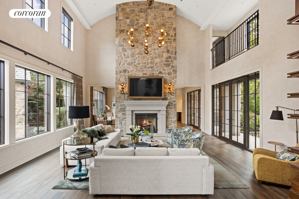 Chandelier, Fireplace, Interior, Living room, Pendant Lights, Stone Walls, Wood Texture Flooring
