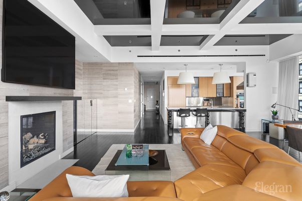 Fireplace, Interior, Kitchen, Living room, Pendant Lights, Stainless Steel Appliances, Stone Walls, Wood Texture Flooring