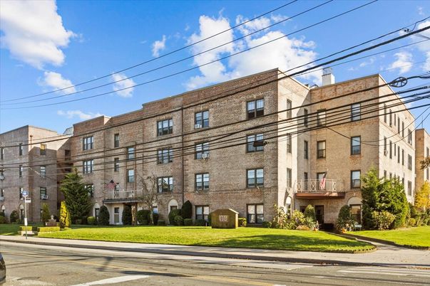 Exterior, Facade, Brick Facade, Condo Building