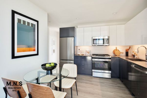 Dining room, Interior, Kitchen, Recessed Lighting, Stainless Steel Appliances, Wood Texture Flooring