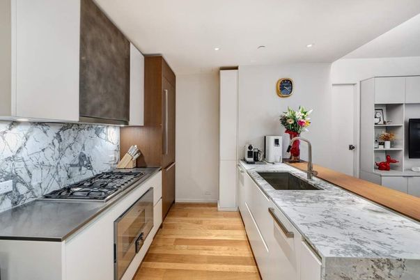 Interior, Kitchen, Marble Walls, Recessed Lighting, Stainless Steel Appliances, Wood Texture Flooring