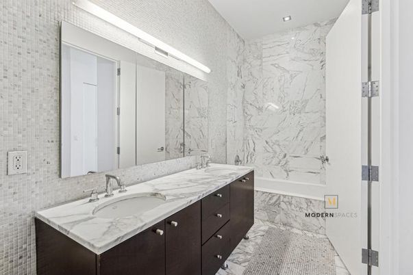 Bathroom, Dual Sink Vanities, Interior, Marble, Marble Walls, Recessed Lighting