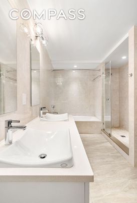 Bathroom, Dual Sink Vanities, Glass Shower, Interior, Recessed Lighting, Wood Texture Flooring