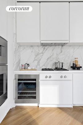 Interior, Kitchen, Marble Walls, Stainless Steel Appliances, Wood Texture Flooring
