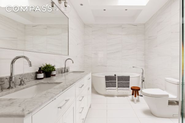 Bathroom, Dual Sink Vanities, Free Standing Baths, Interior, Marble, Marble Walls, Recessed Lighting