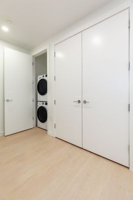 Empty room, Interior, Recessed Lighting, Utility Closets, Washer, Wood Texture Flooring