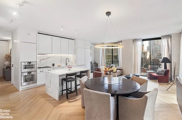 Dining room, Interior, Kitchen, Marble Walls, Pendant Lights, Recessed Lighting, Stainless Steel Appliances, Wood Texture Flooring