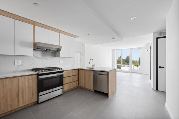 Interior, Kitchen, Marble Walls, Recessed Lighting, Stainless Steel Appliances
