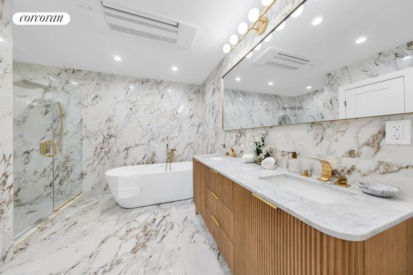 Bathroom, Dual Sink Vanities, Free Standing Baths, Glass Shower, Interior, Marble, Marble Walls, Recessed Lighting