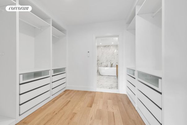 Bathroom, Free Standing Baths, Interior, Marble, Recessed Lighting, Walk-in Closets, Wood Texture Flooring