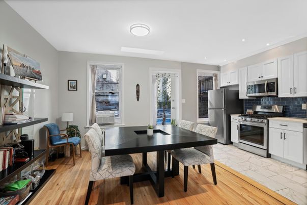 Dining room, Interior, Kitchen, Recessed Lighting, Stainless Steel Appliances, Wood Texture Flooring