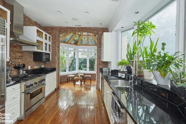 Dining room, Interior, Kitchen, Recessed Lighting, Stainless Steel Appliances, Stone Walls, Wood Texture Flooring
