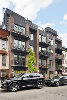 Exterior, Facade, Brick Facade, Condo Building