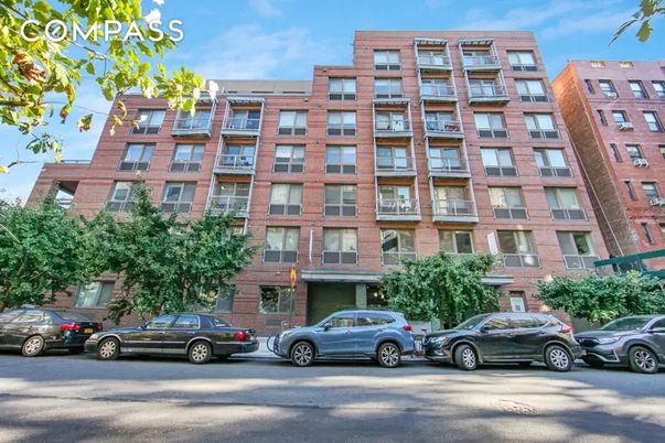 Exterior, Facade, Brick Facade, Condo Building