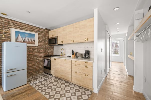 Interior, Kitchen, Recessed Lighting, Stone Walls, Wood Texture Flooring