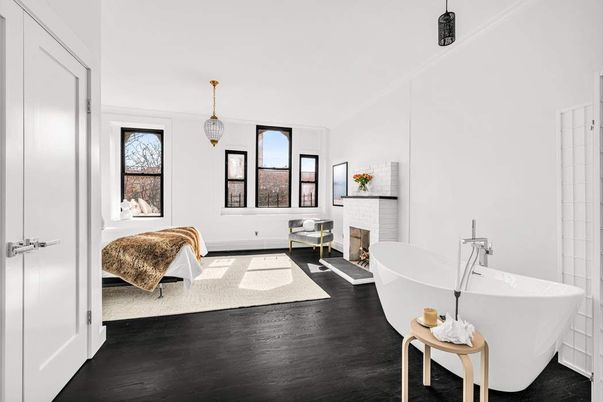 Bathroom, Fireplace, Free Standing Baths, Interior, Pendant Lights, Wood Texture Flooring
