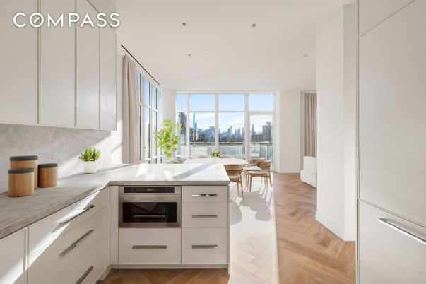 Dining room, Interior, Kitchen, Recessed Lighting, Stainless Steel Appliances, Water, Wood Texture Flooring
